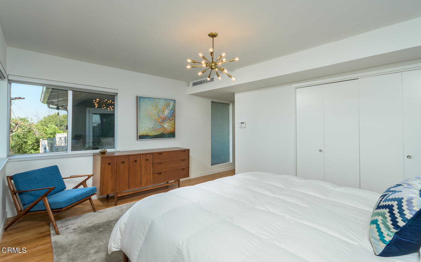 667 Glen Avenue Glendale, CA 91206 - Photo 22 of 46 a bedroom with a bed and a dresser