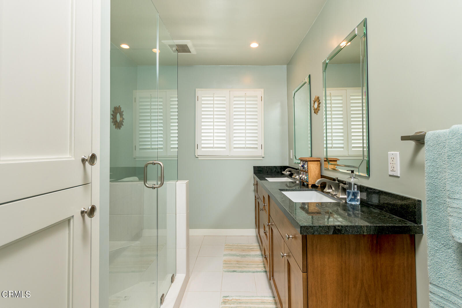 667 Glen Avenue Glendale, CA 91206 - Photo 23 of 46 a bathroom with a granite countertop sink a toilet and shower