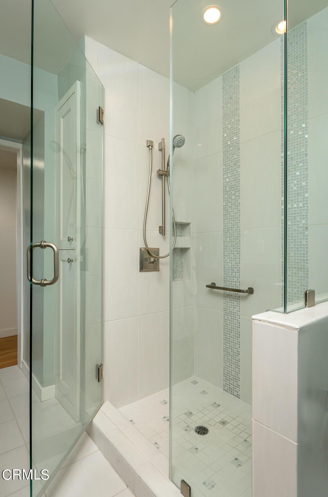 667 Glen Avenue Glendale, CA 91206 - Photo 24 of 46 a bathroom with a shower and a sink