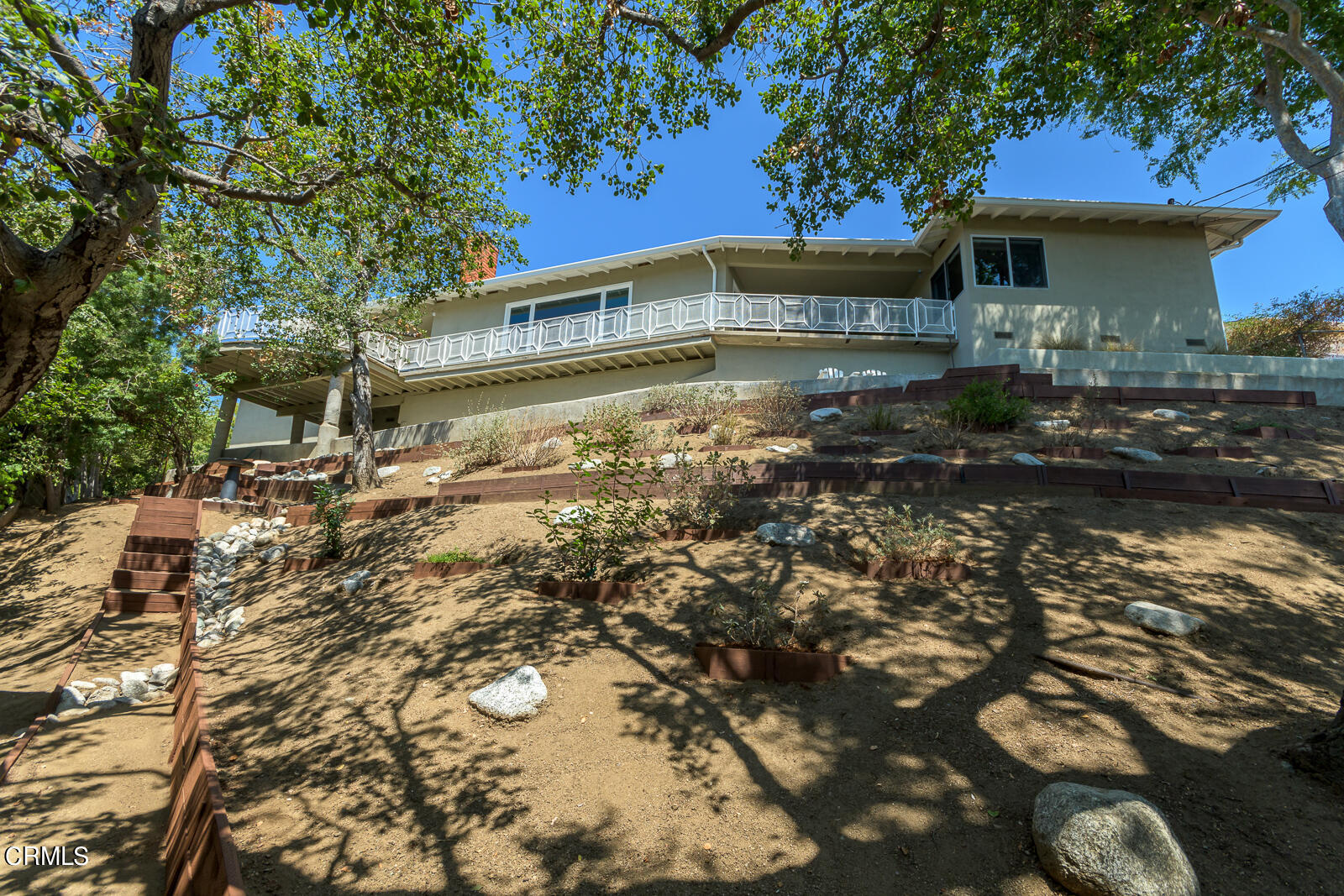 667 Glen Avenue Glendale, CA 91206 - Photo 45 of 46 a front view of a house with a yard