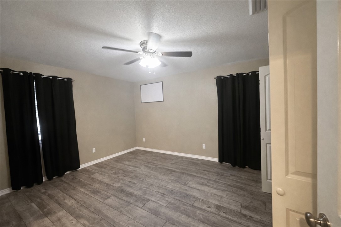 4005 Ridge Trail Robstown, TX 78380 - Photo 12 of 20 wooden floor in an empty room