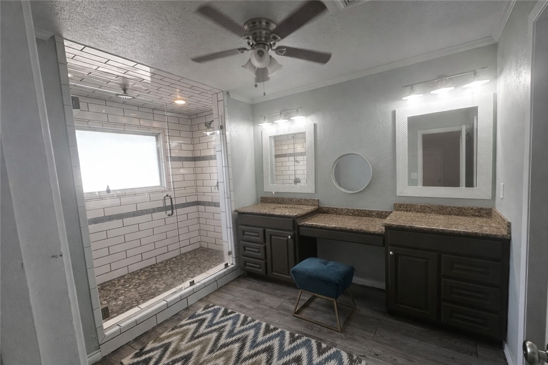 4005 Ridge Trail Robstown, TX 78380 - Photo 16 of 20 a view of a bathroom with dual sinks