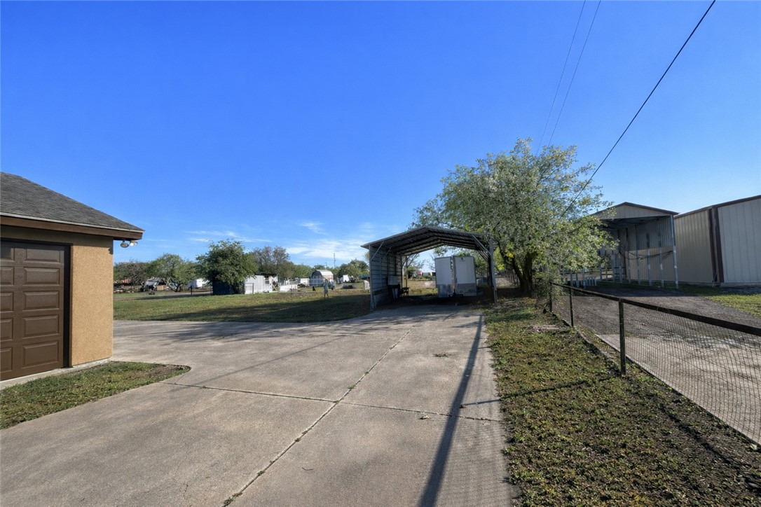 4005 Ridge Trail Robstown, TX 78380 - Photo 4 of 20 a view of a house with a yard