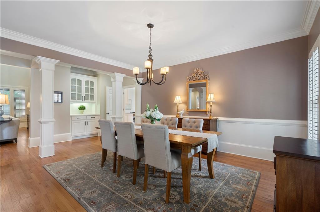1174 Bowerie Chase Powder Springs, GA 30127 - Photo 12 of 70 a view of a dining room with furniture