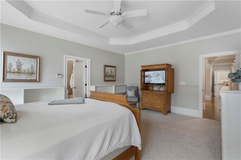 1174 Bowerie Chase Powder Springs, GA 30127 - Photo 24 of 70 a bedroom with a bed and a couch