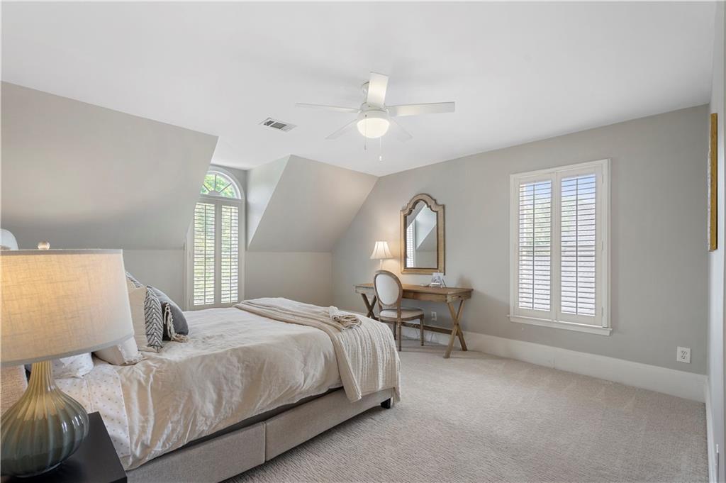 1174 Bowerie Chase Powder Springs, GA 30127 - Photo 40 of 70 a bedroom with a bed couch and window