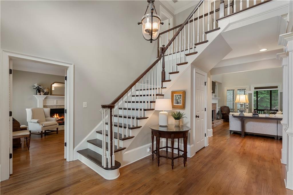 1174 Bowerie Chase Powder Springs, GA 30127 - Photo 4 of 70 a view of entryway livingroom and hall with wooden floor