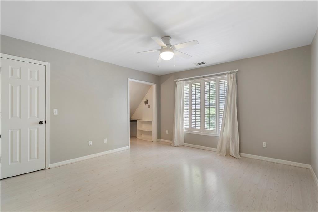 1174 Bowerie Chase Powder Springs, GA 30127 - Photo 44 of 70 a view of an empty room with a window