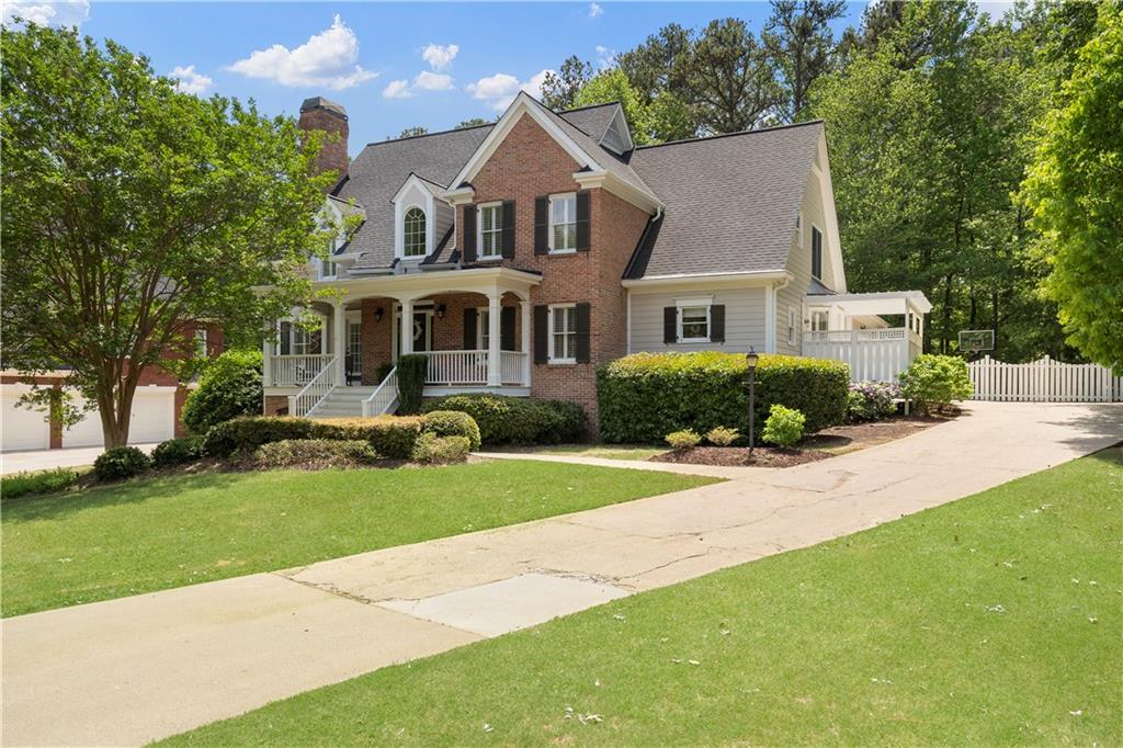 1174 Bowerie Chase Powder Springs, GA 30127 - Photo 67 of 70 front view of a house with a yard