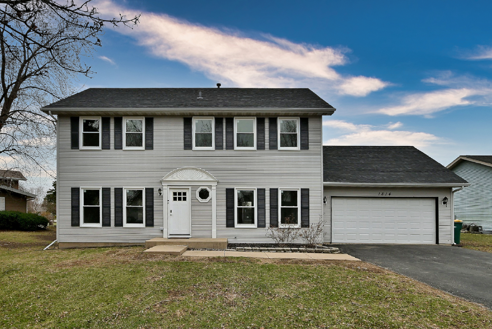1814 Addleman Street Joliet, IL 60431 - Photo 1 of 2 front view of house with a yard