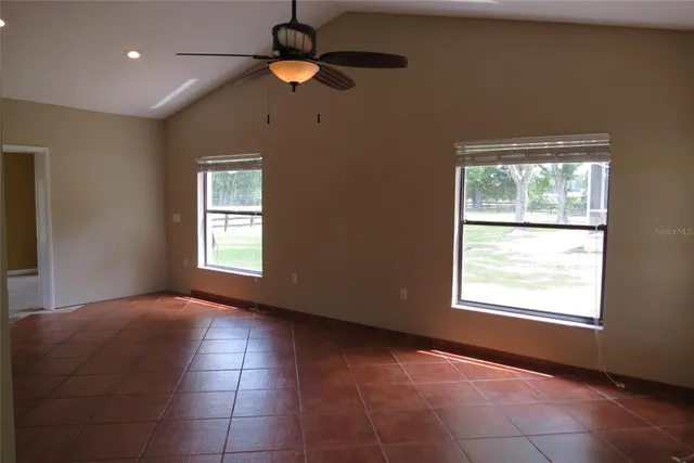 an empty room with windows