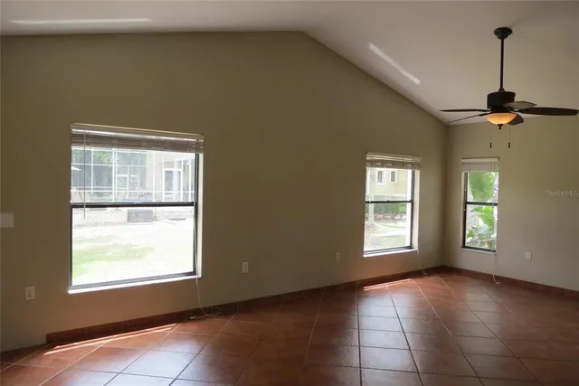 an empty room that has a window