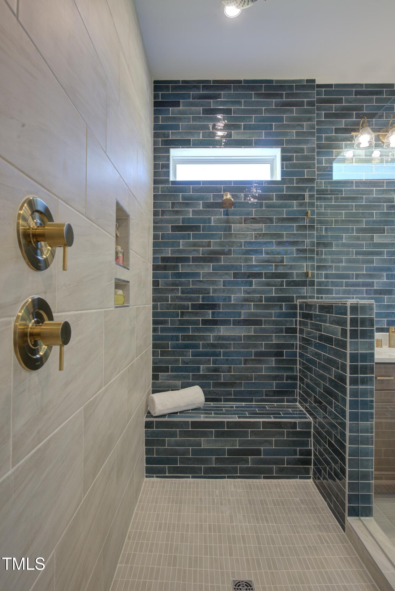 306 Golden Leaf Farms Road Angier, NC 27501 - Photo 11 of 21 a bathroom with a shower