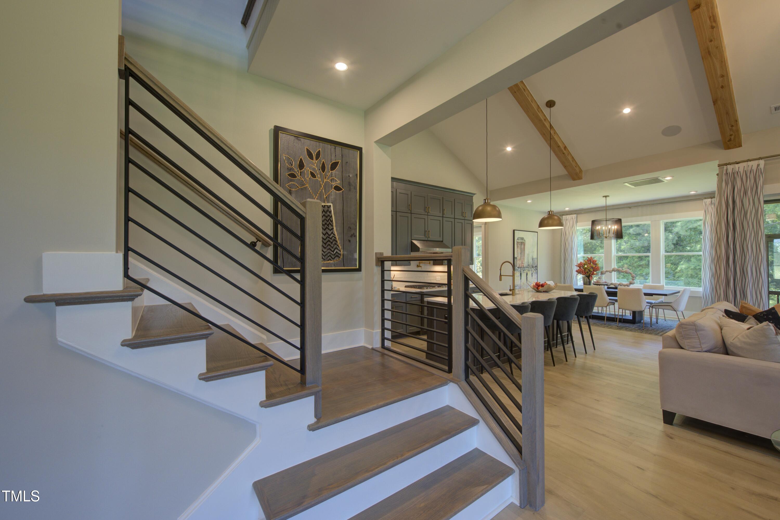 306 Golden Leaf Farms Road Angier, NC 27501 - Photo 15 of 21 a lobby with furniture and a rug