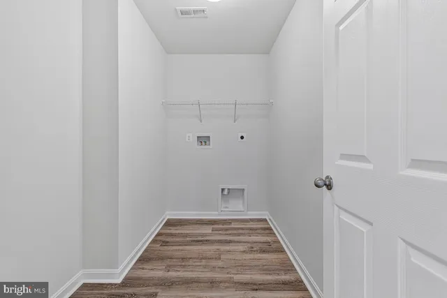 a bathroom with 2 sink and a mirror