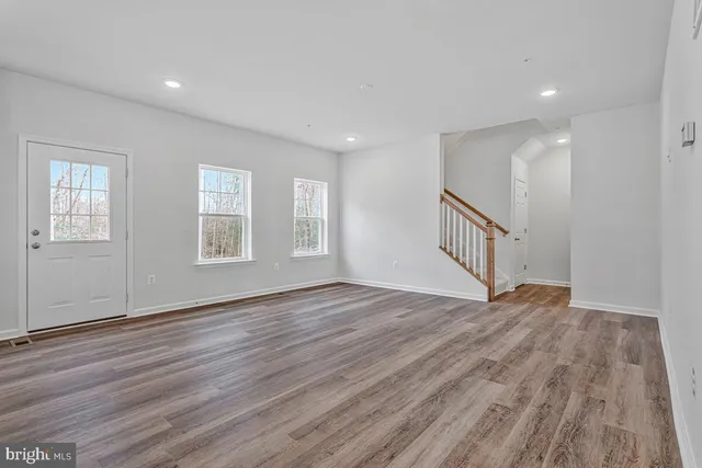 a view of kitchen with wooden floor and window
