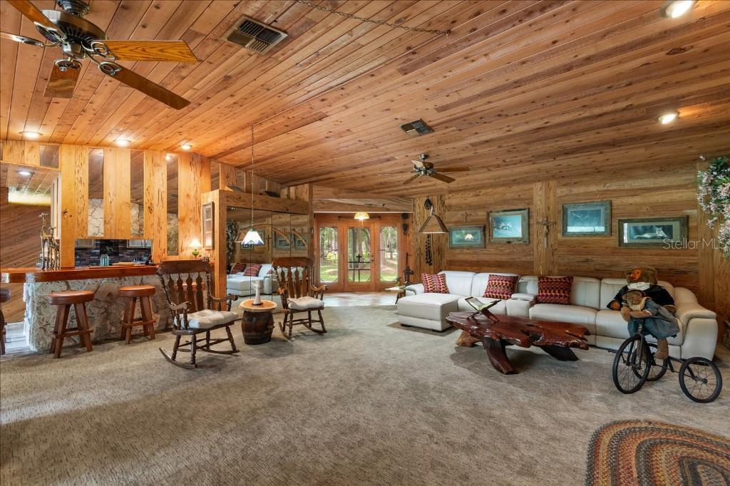 935 Ranch Road Tarpon Springs, FL 34688 - Photo 12 of 40 a view of a big room with gym equipment