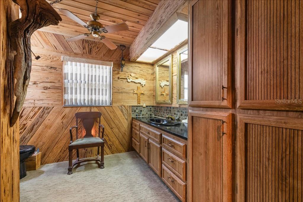 935 Ranch Road Tarpon Springs, FL 34688 - Photo 26 of 40 a kitchen with a stove and a refrigerator