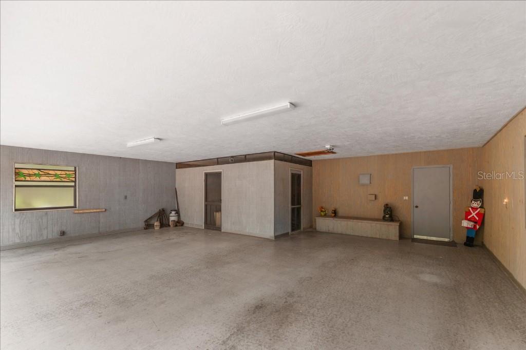 935 Ranch Road Tarpon Springs, FL 34688 - Photo 35 of 40 an empty room with natural light