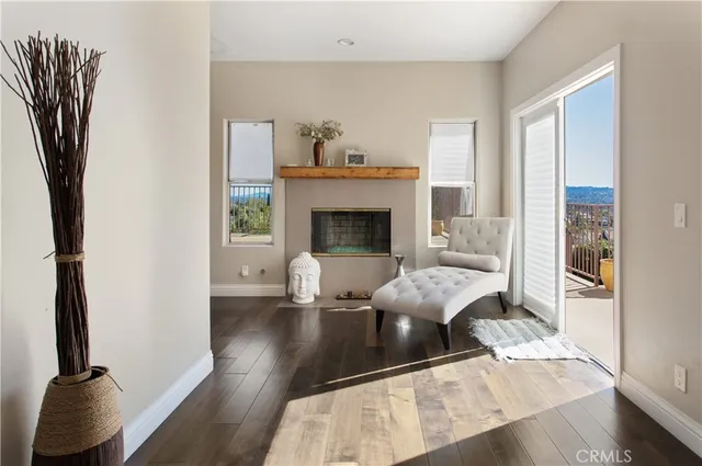a spacious bathroom with a double vanity sink a mirror a bathtub and a shower