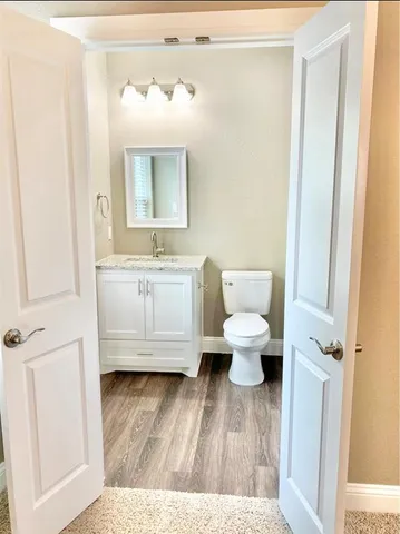 a bathroom with a toilet and a bathtub