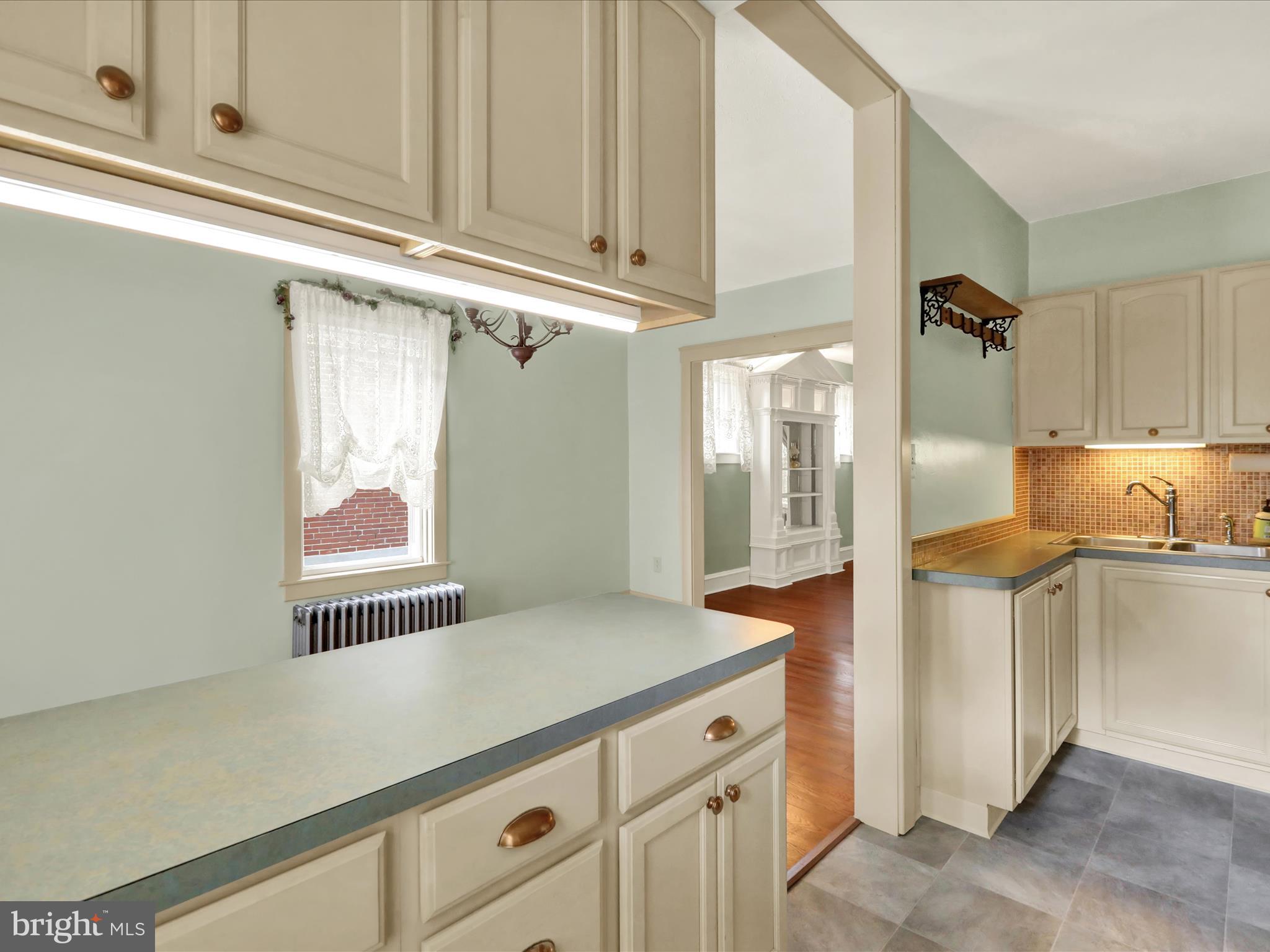 519 Friedensburg Road Reading, PA 19606 - Photo 15 of 47 a kitchen with stainless steel appliances a refrigerator and cabinets