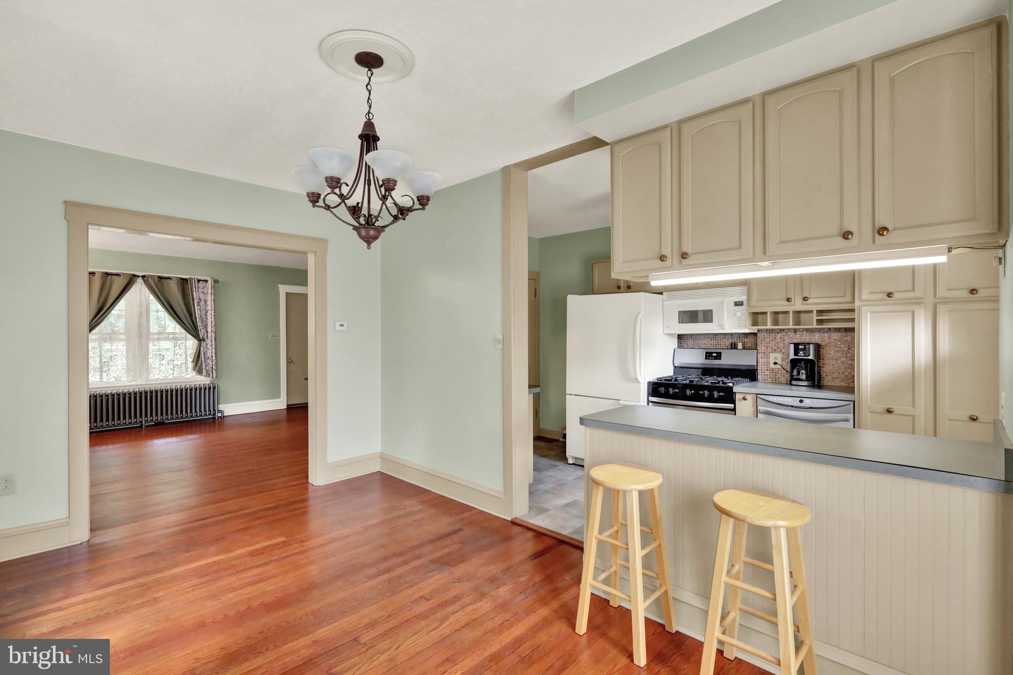 519 Friedensburg Road Reading, PA 19606 - Photo 19 of 47 a kitchen with granite countertop white cabinets and stainless steel appliances