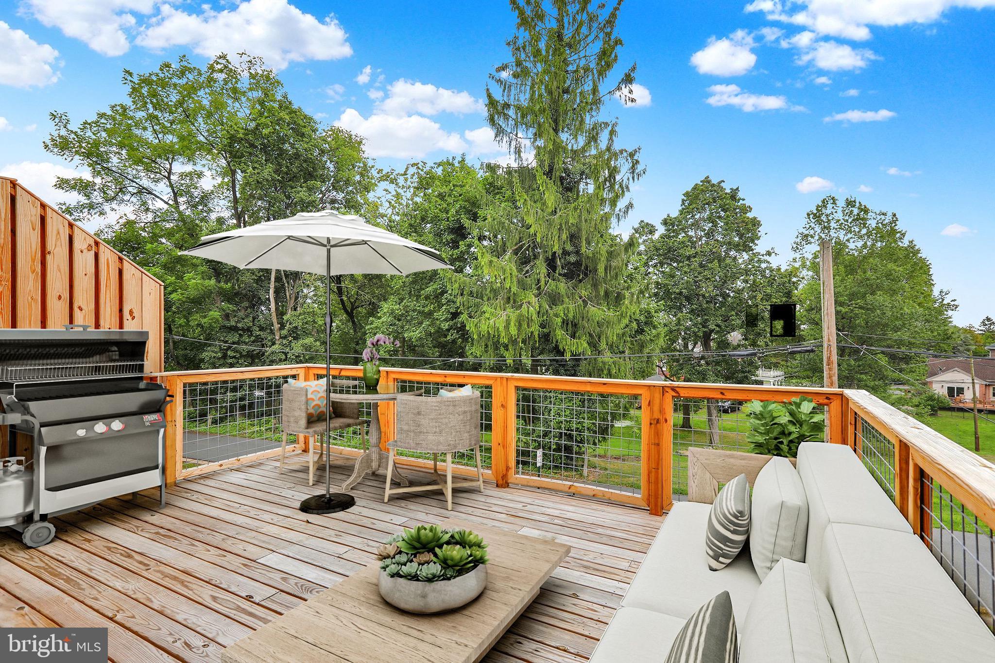 519 Friedensburg Road Reading, PA 19606 - Photo 22 of 47 a view of balcony with wooden floor and barbeque oven