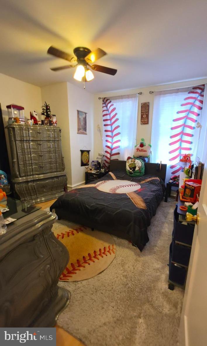 4113 Comly Street Philadelphia, PA 19135 - Photo 18 of 21 a bedroom with a bed window and dresser