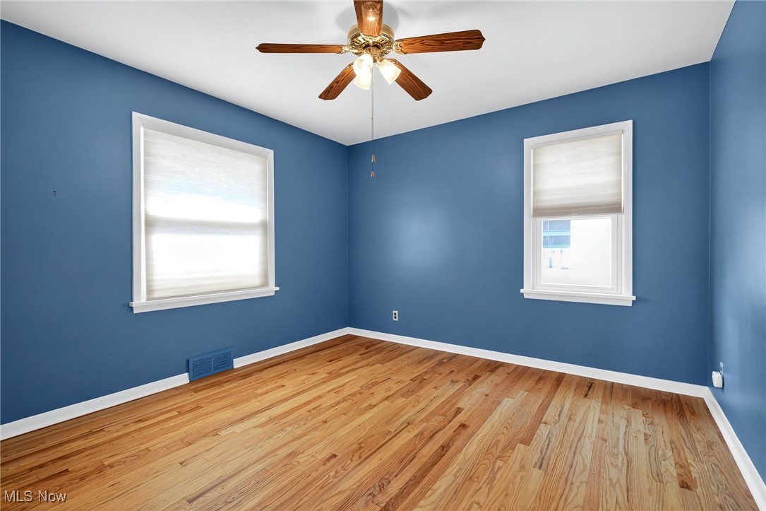 1806 Empire Road Wickliffe, OH 44092 - Photo 13 of 35 Spare room with wood finished floors and ceiling fan