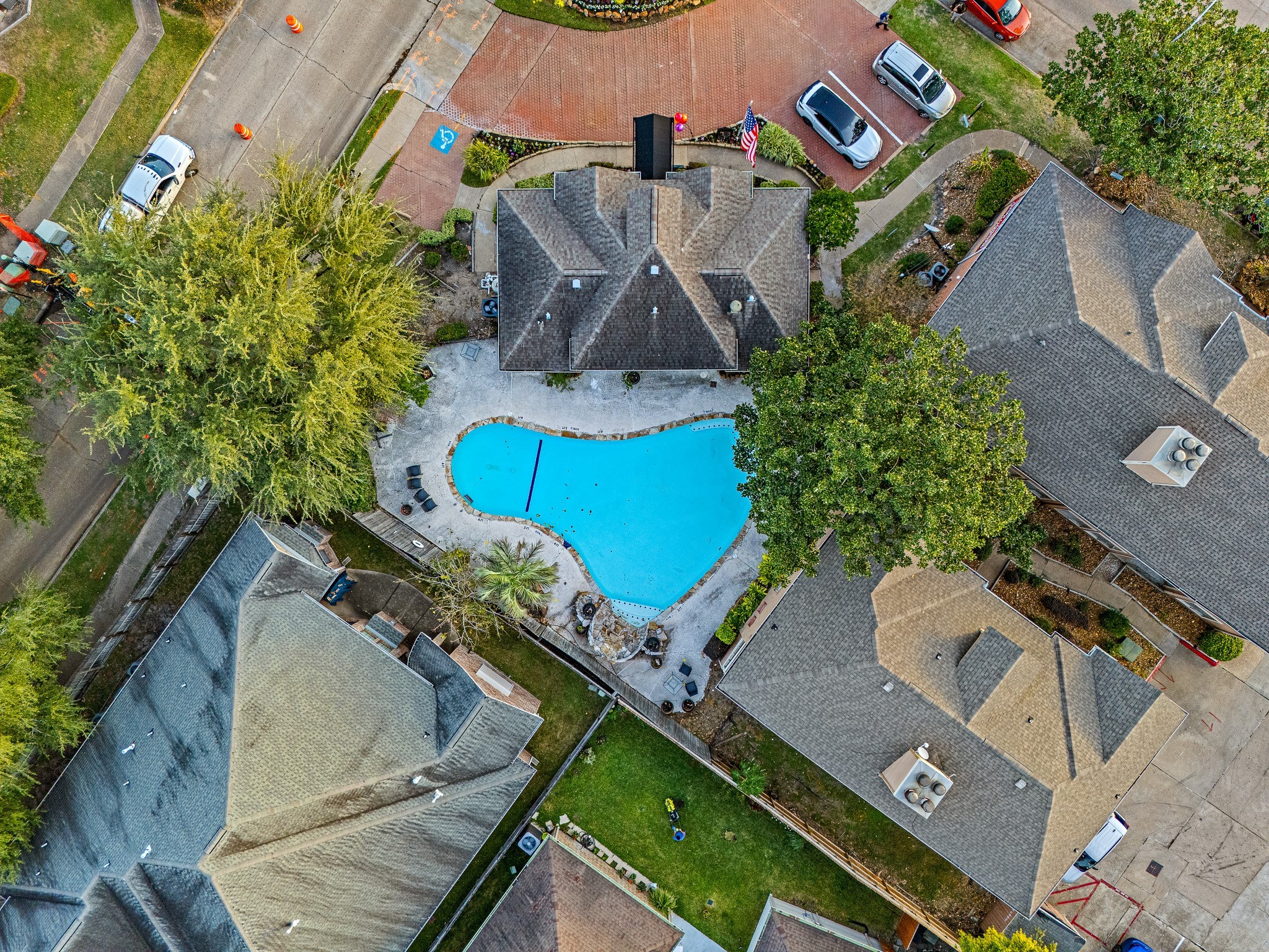 an aerial view of a house with a garden