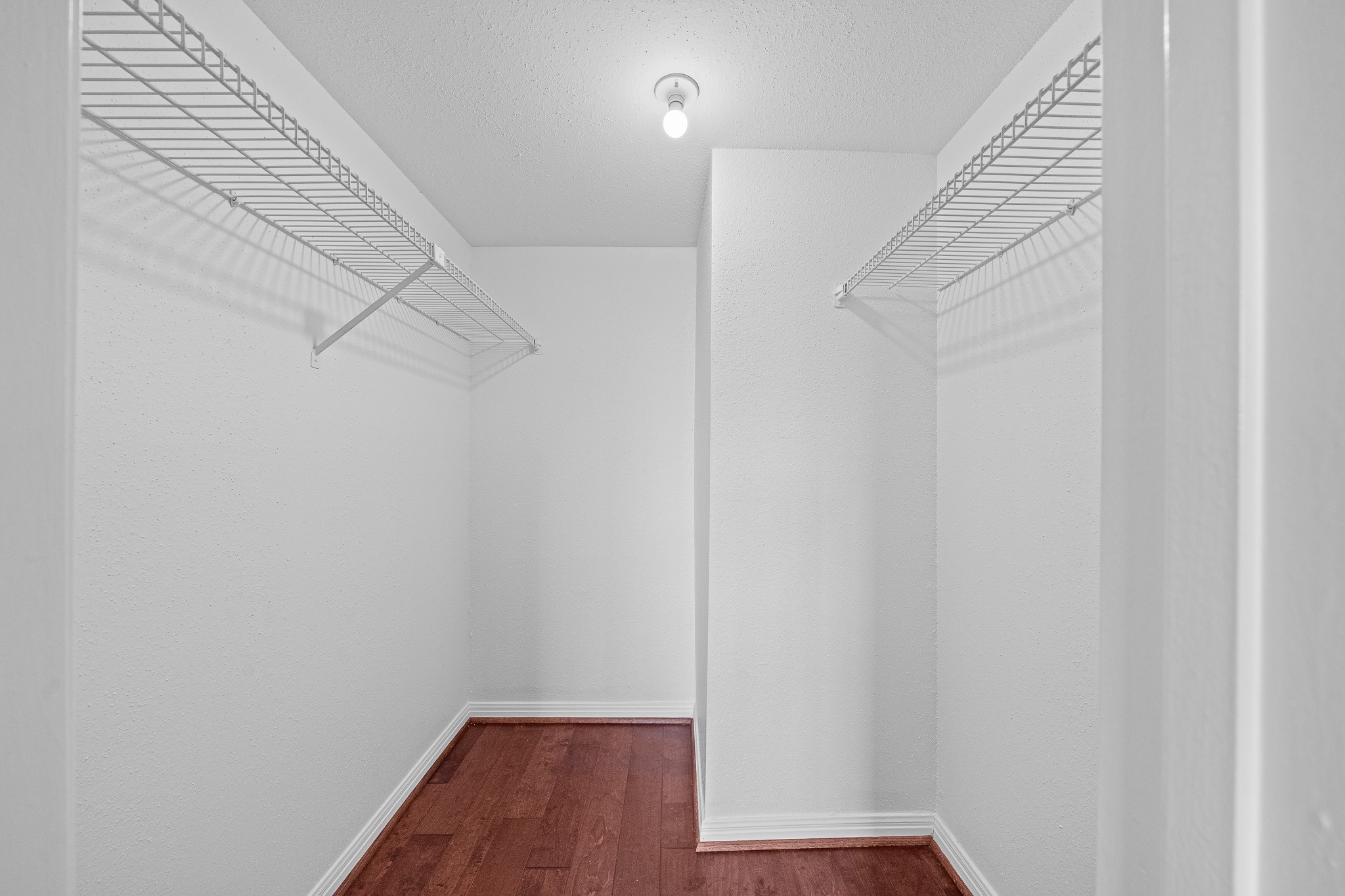 12100 Overbrook Lane, Unit 17D Houston, TX 77077 - Photo 14 of 22 a view of small space with racks on the wall