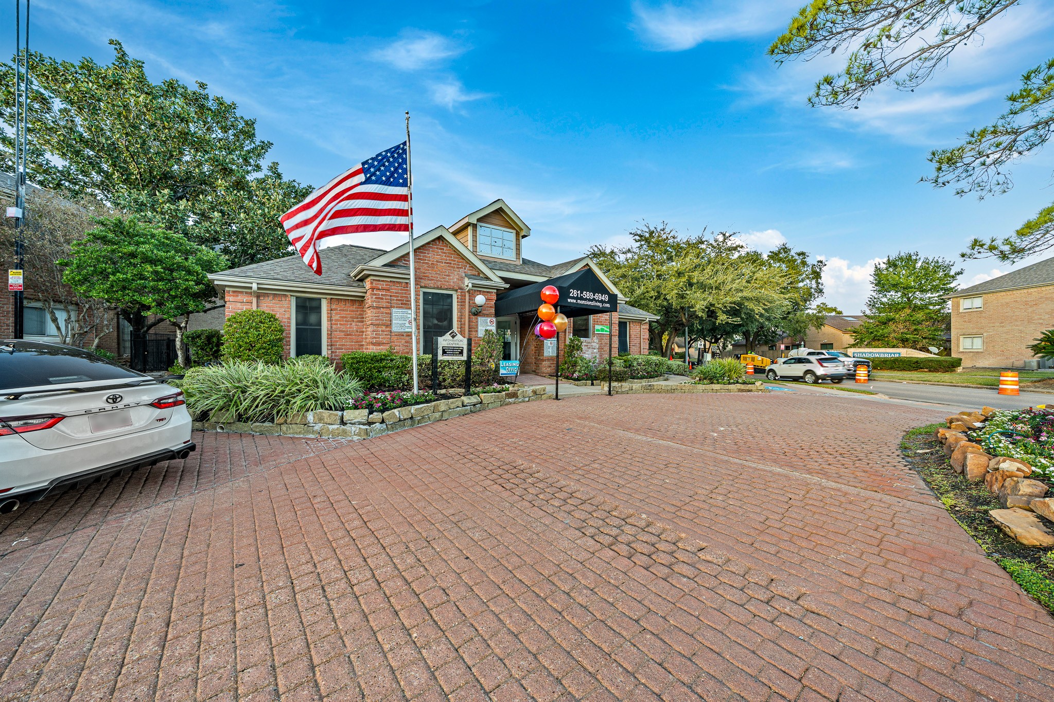 12100 Overbrook Lane, Unit 17D Houston, TX 77077 - Photo 20 of 22 a view of street with cars parked