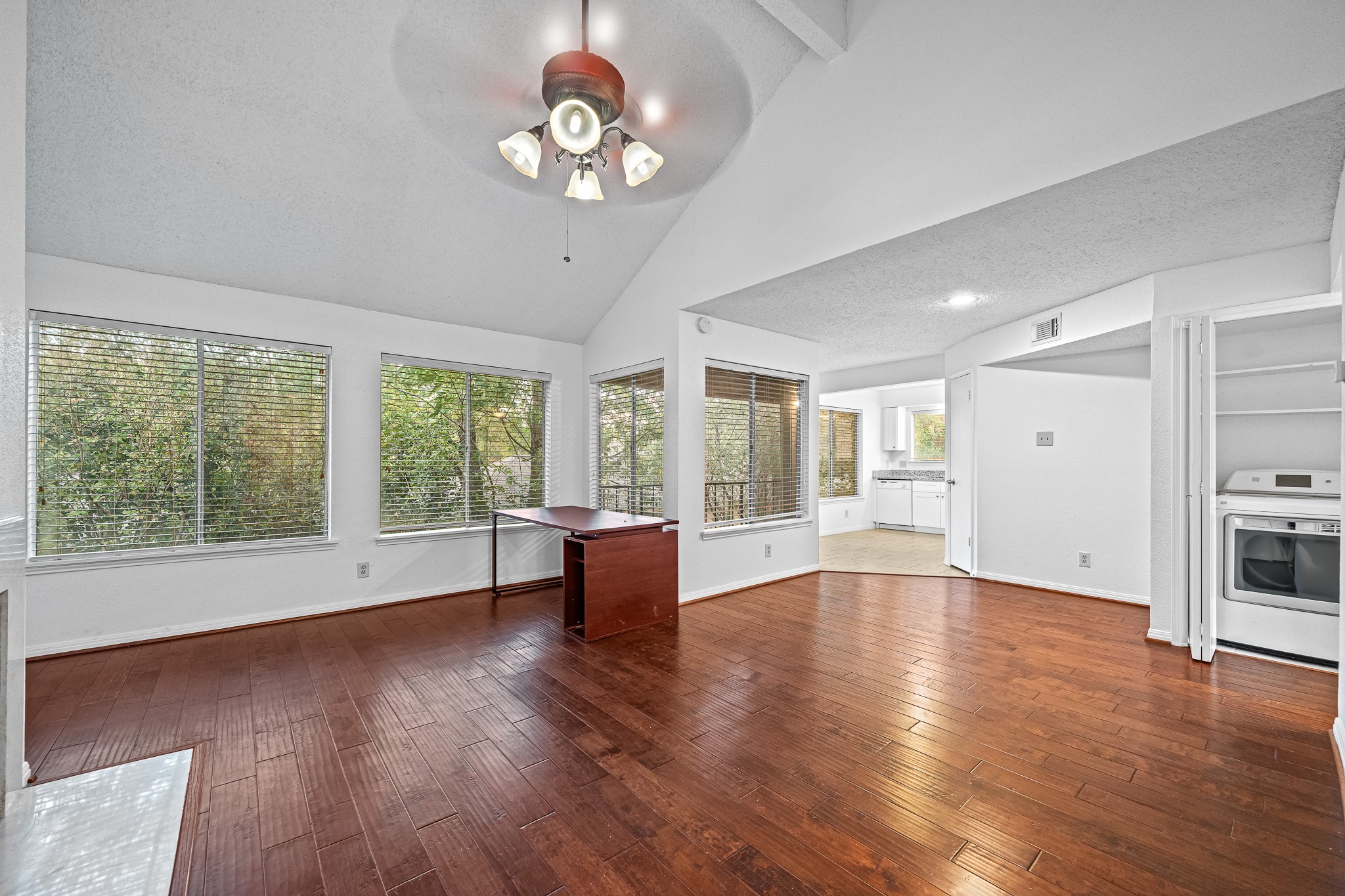 12100 Overbrook Lane, Unit 17D Houston, TX 77077 - Photo 7 of 22 a view of livingroom with furniture wooden floor and window
