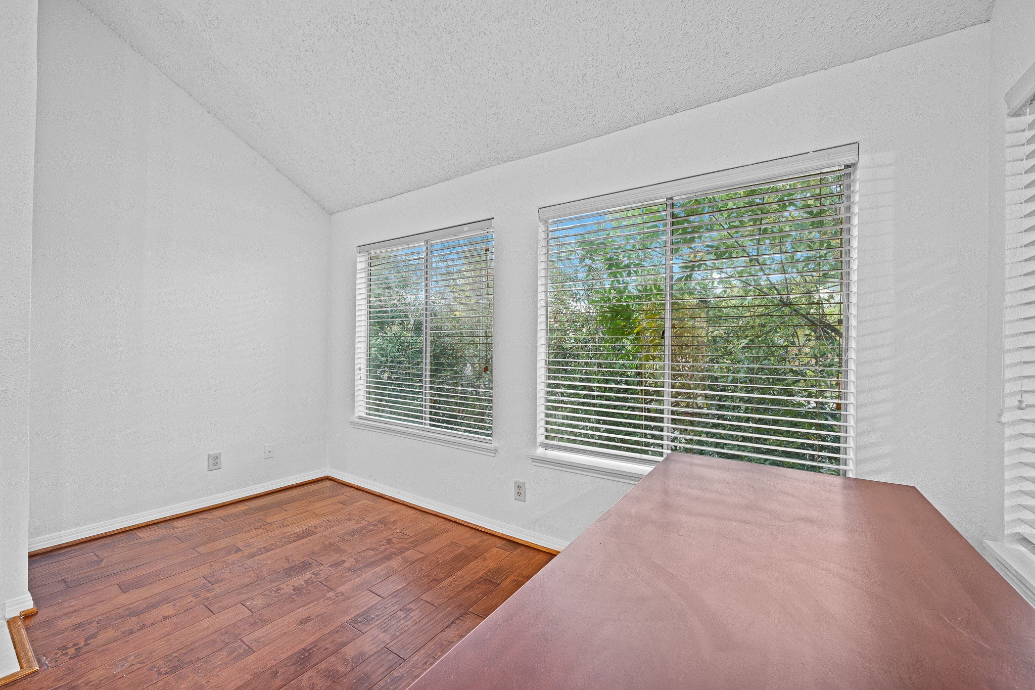 12100 Overbrook Lane, Unit 17D Houston, TX 77077 - Photo 8 of 22 a view of a room with a large window