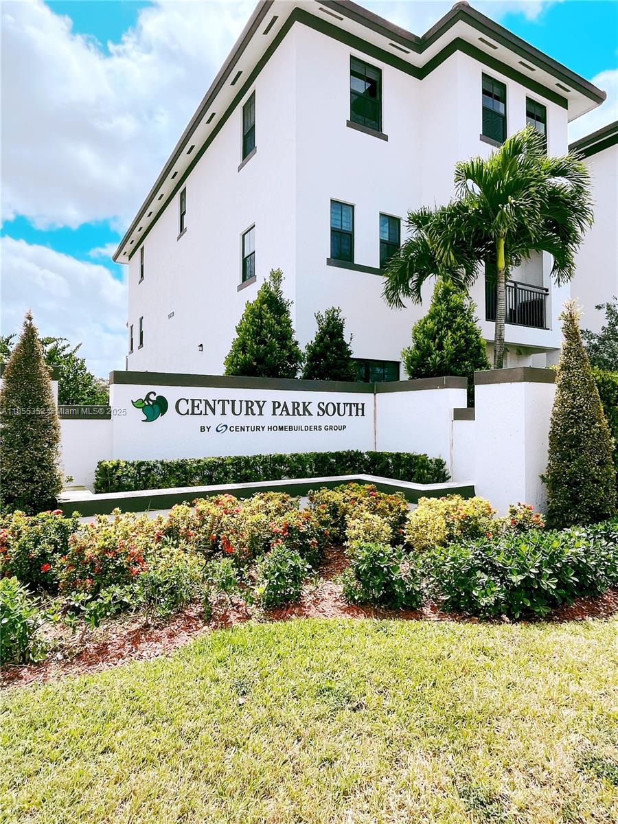 a view of a house with a garden