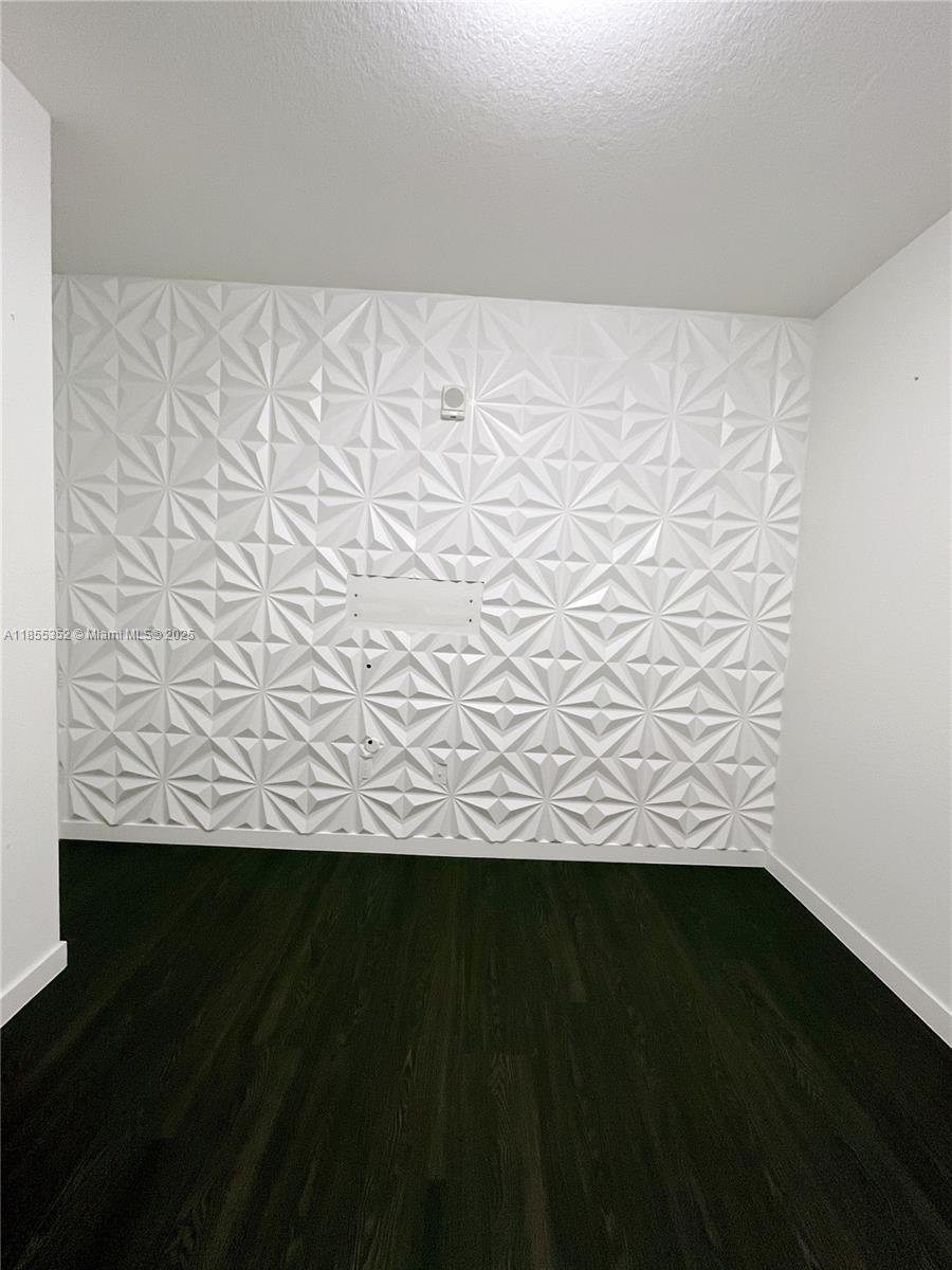 15650 Southwest 136th Street, Unit 218 Miami, FL 33196 - Photo 14 of 25 a view of wooden floor