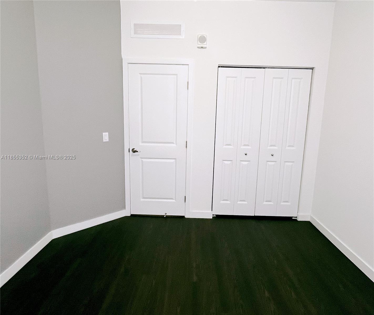 15650 Southwest 136th Street, Unit 218 Miami, FL 33196 - Photo 6 of 25 close view of door with yard