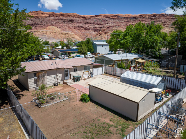 527 Palisade Drive Moab, UT 84532 - Photo 37 of 51 Drone / aerial view of a mountainous background