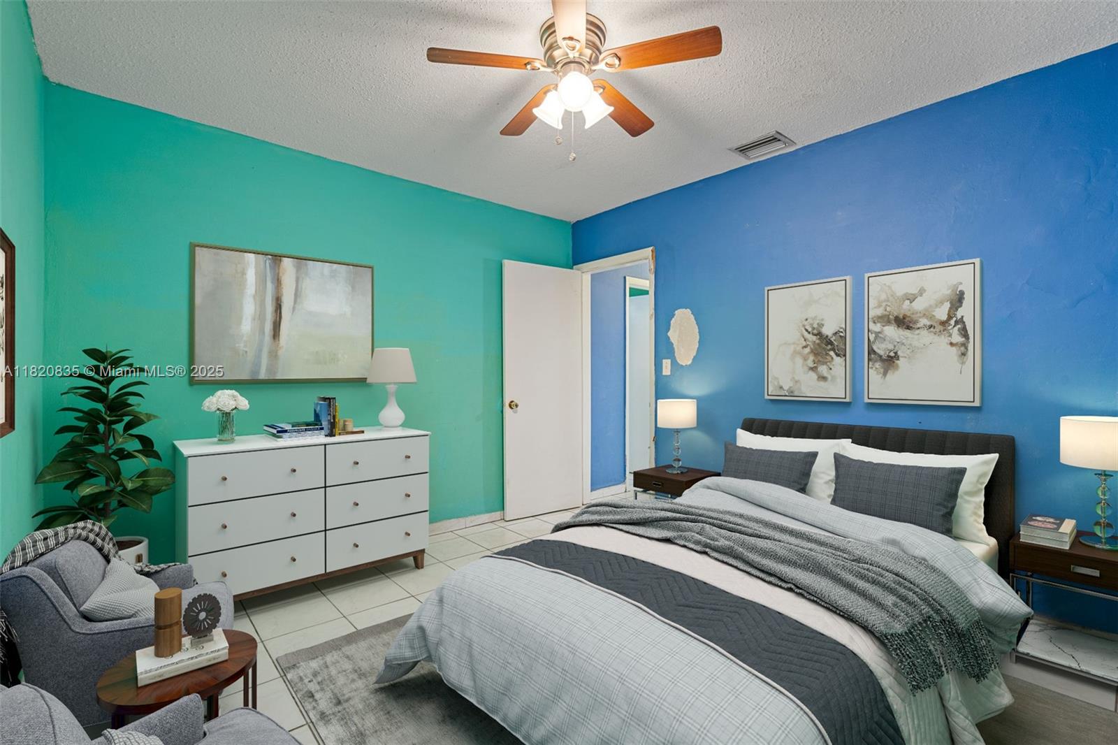 2920 Southwest 37th Court Miami, FL 33134 - Photo 15 of 48 a bedroom with a bed and a chandelier