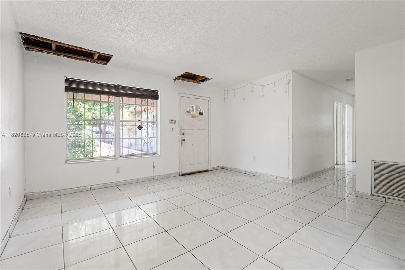 2920 Southwest 37th Court Miami, FL 33134 - Photo 19 of 48 a view of an empty room with a window