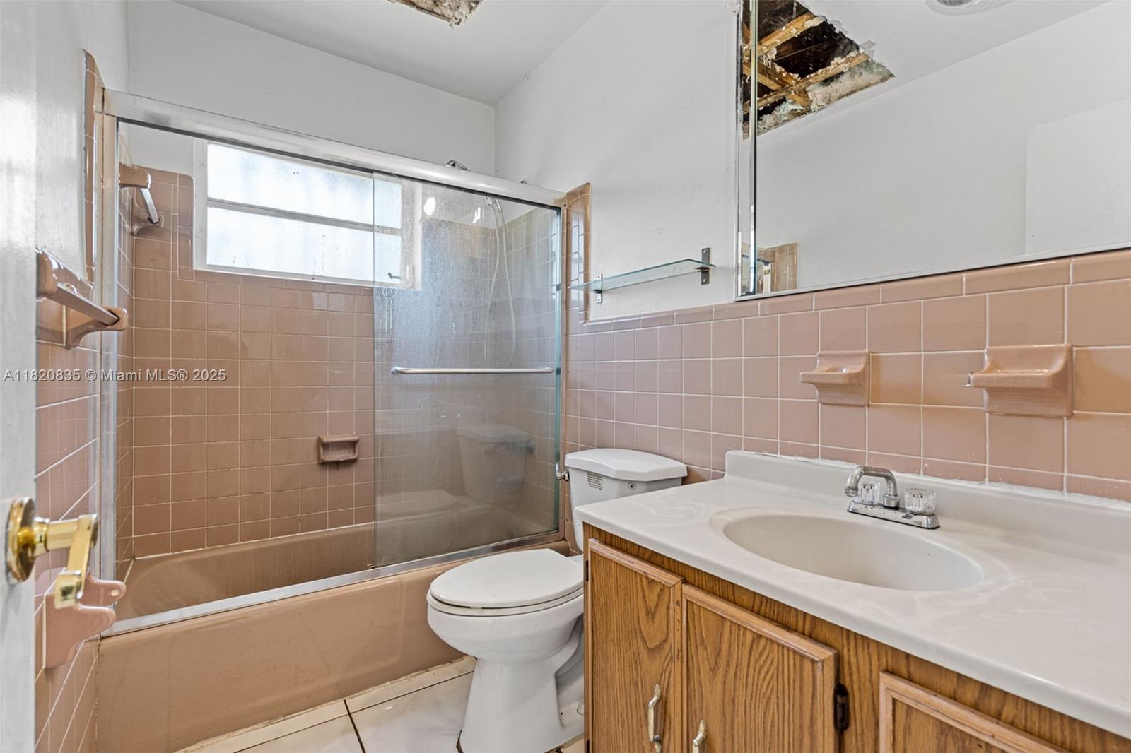 2920 Southwest 37th Court Miami, FL 33134 - Photo 32 of 48 a bathroom with a sink a toilet and shower