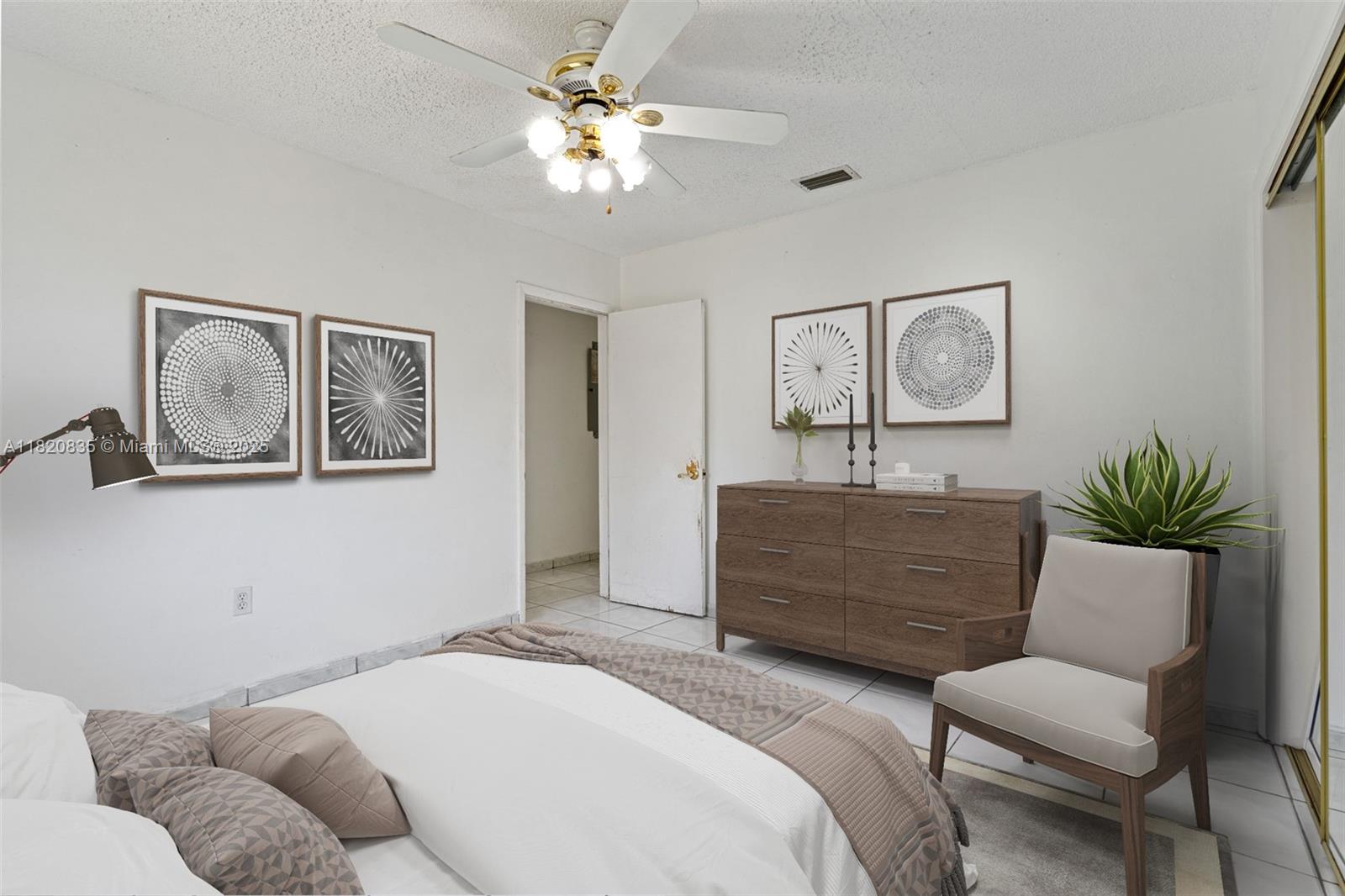 2920 Southwest 37th Court Miami, FL 33134 - Photo 34 of 48 a bedroom with a bed couch and dresser