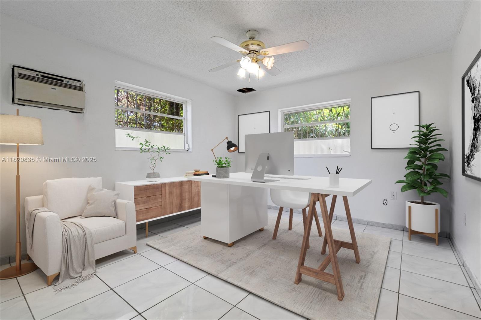 2920 Southwest 37th Court Miami, FL 33134 - Photo 35 of 48 a living room with furniture and a chandelier