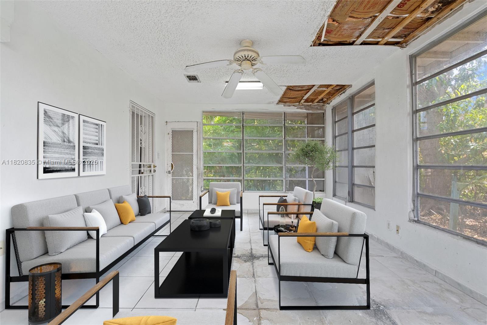 2920 Southwest 37th Court Miami, FL 33134 - Photo 40 of 48 a living room with furniture and a large window