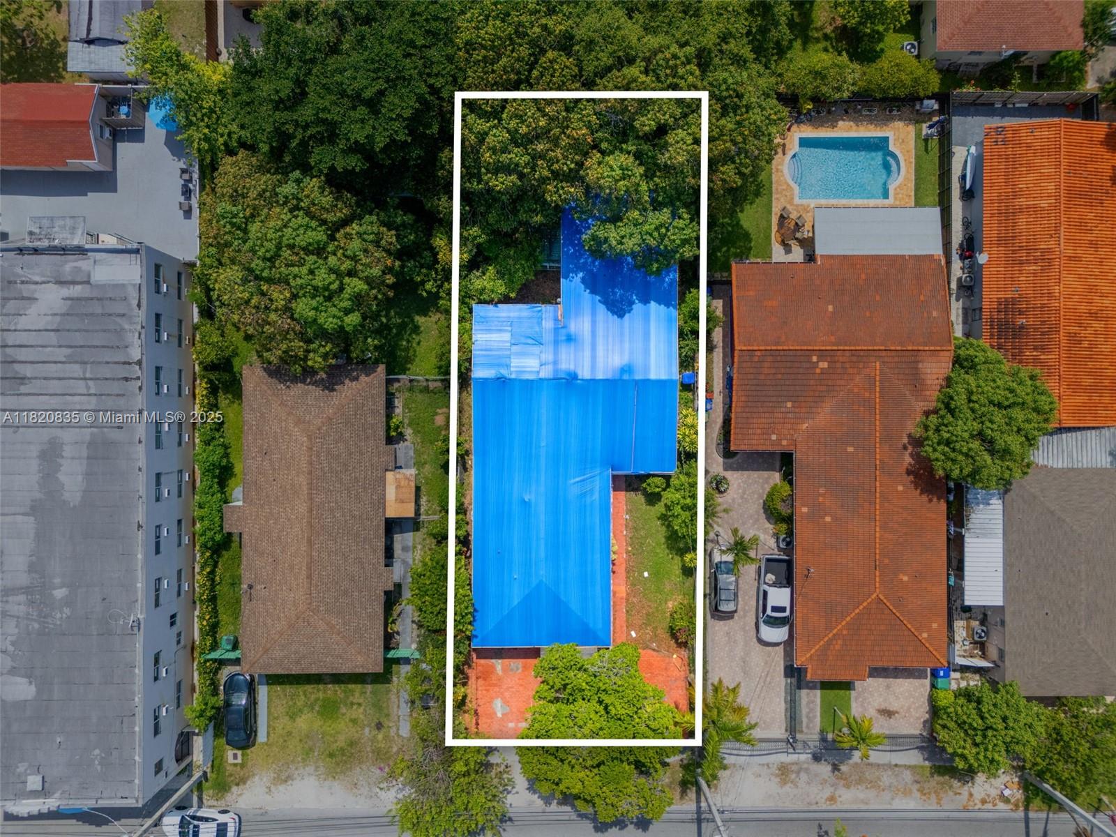 2920 Southwest 37th Court Miami, FL 33134 - Photo 43 of 48 front view of house with a yard