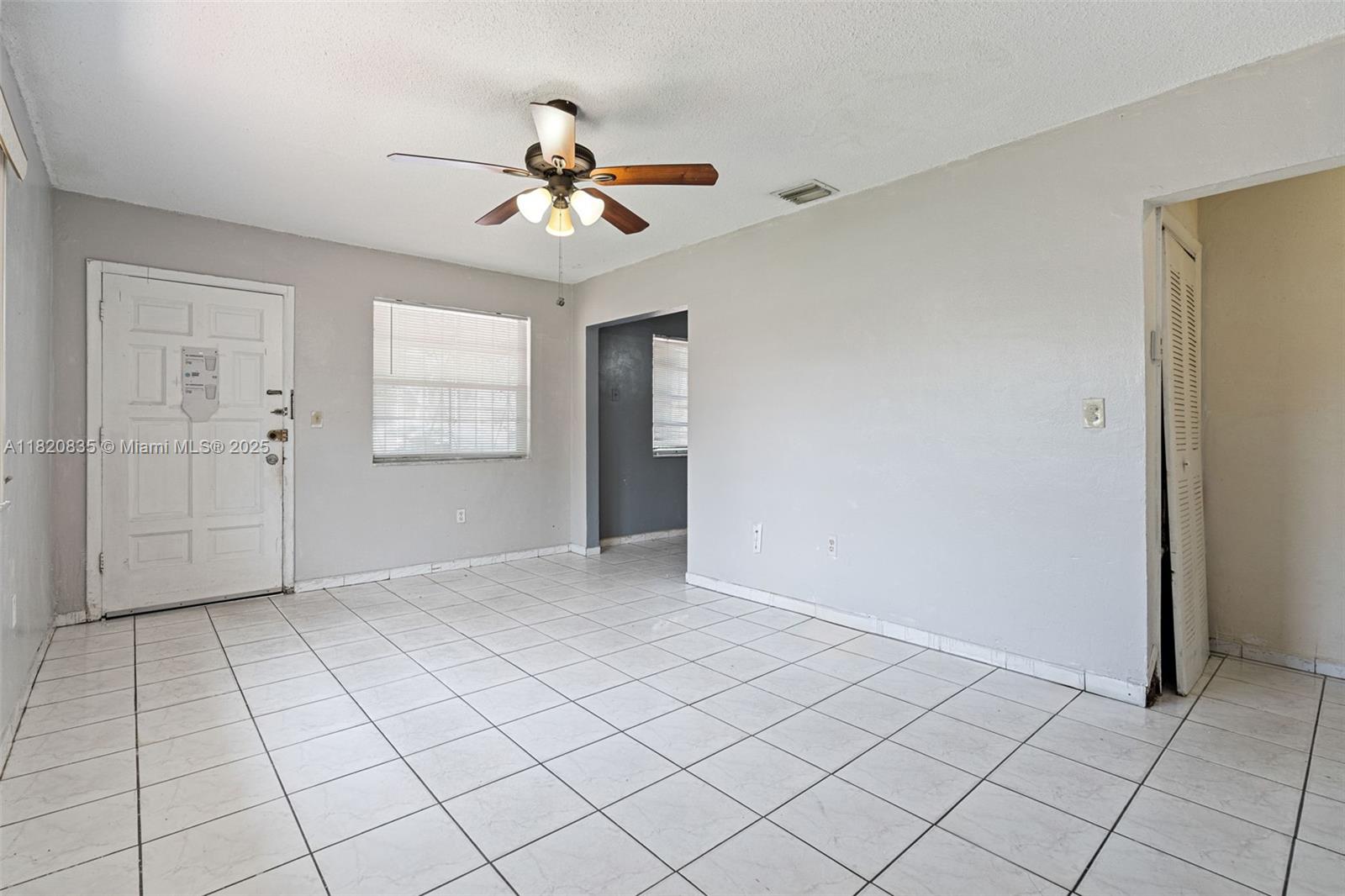 2920 Southwest 37th Court Miami, FL 33134 - Photo 7 of 48 a view of an empty room and chandelier fan