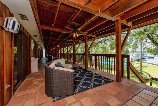 a view of swimming pool with seating space