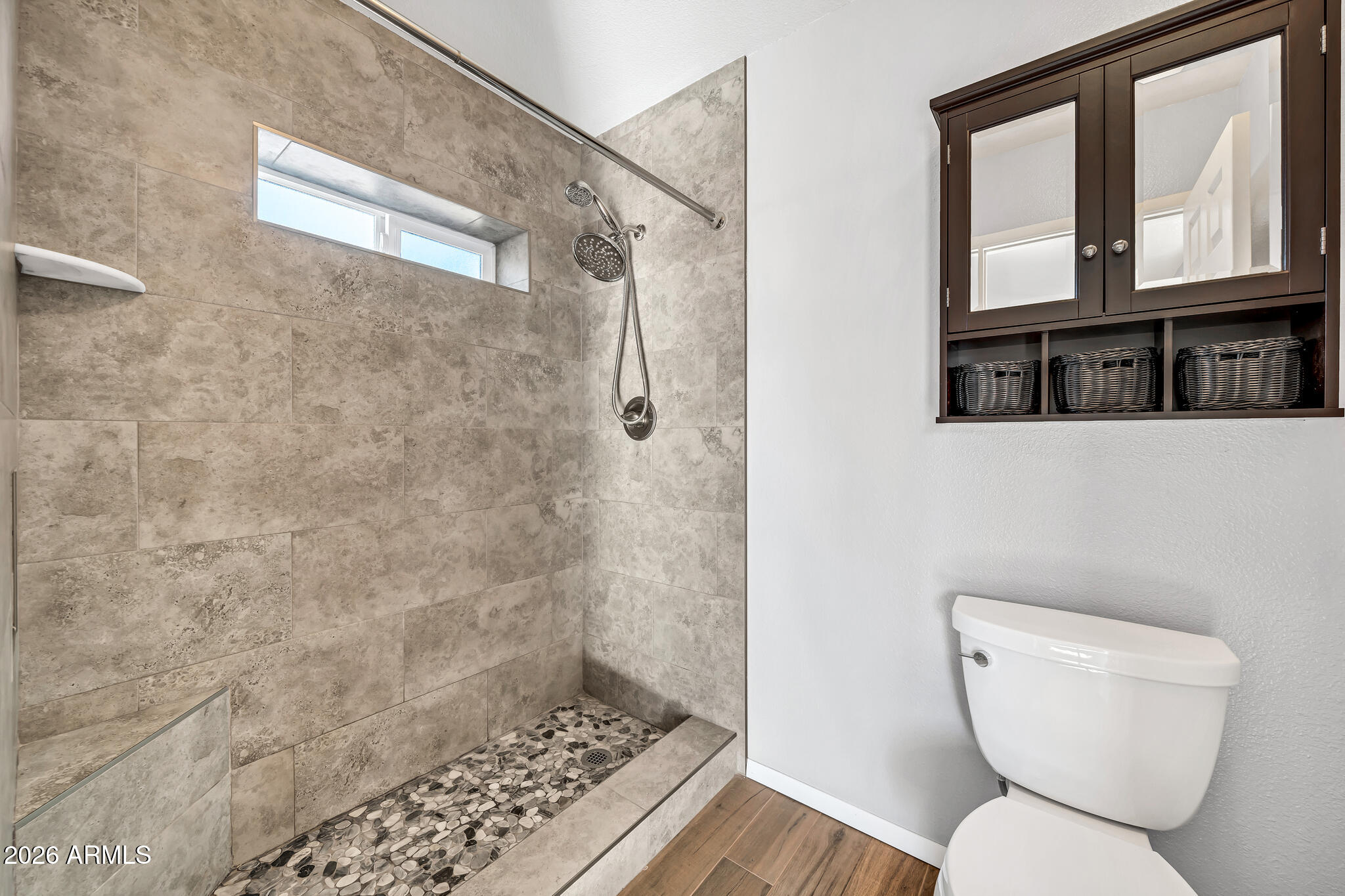 3033 West Kathleen Road Phoenix, AZ 85053 - Photo 20 of 42 a bathroom with a toilet and a shower