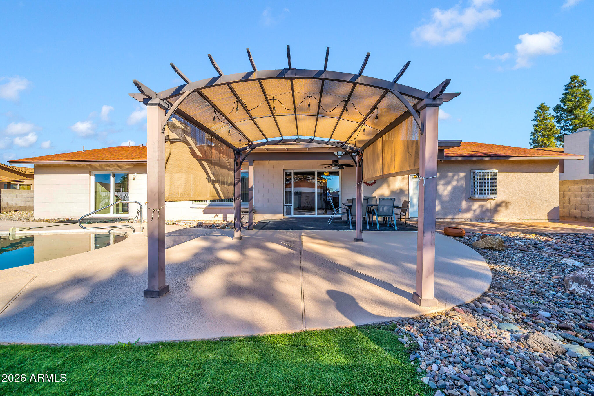 3033 West Kathleen Road Phoenix, AZ 85053 - Photo 29 of 42 a view of a house with a swimming pool